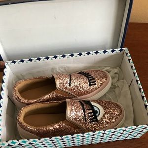 Brand new shiny shoes with sassy winking eye